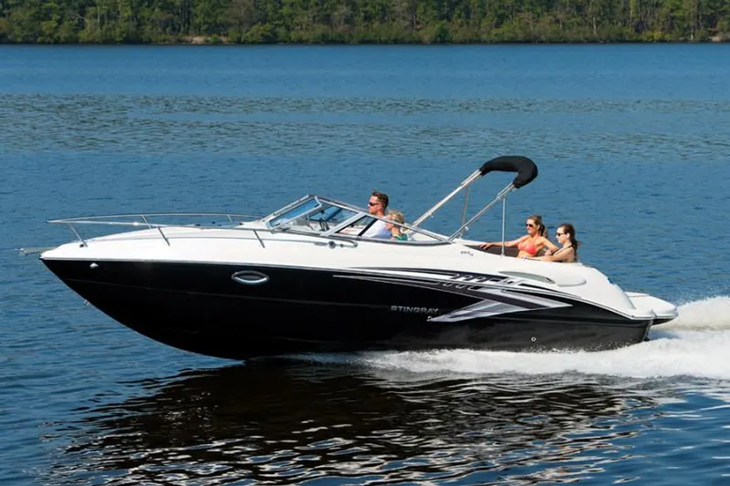 The Image of Manufacturer Provided Image: 2019 Stingray 250 CR boat cruising on a lake with passengers. - 0