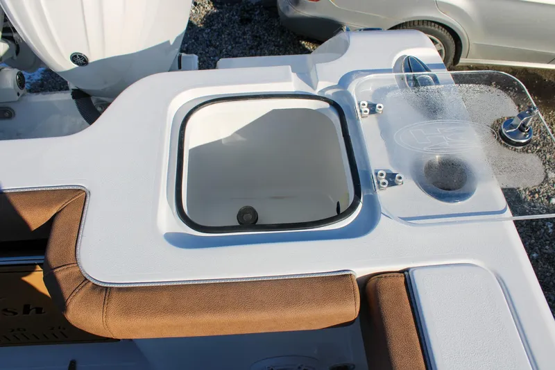 Slide: The Image of 2026 Sea Hunt Gamefish 25 boat interior with livewell and seating area. - 15
