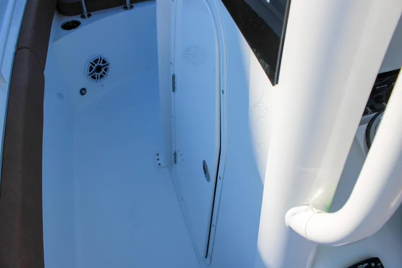 Slide: The Image of 2026 Sea Hunt Gamefish 25 interior with white finish and speaker detail. - 29