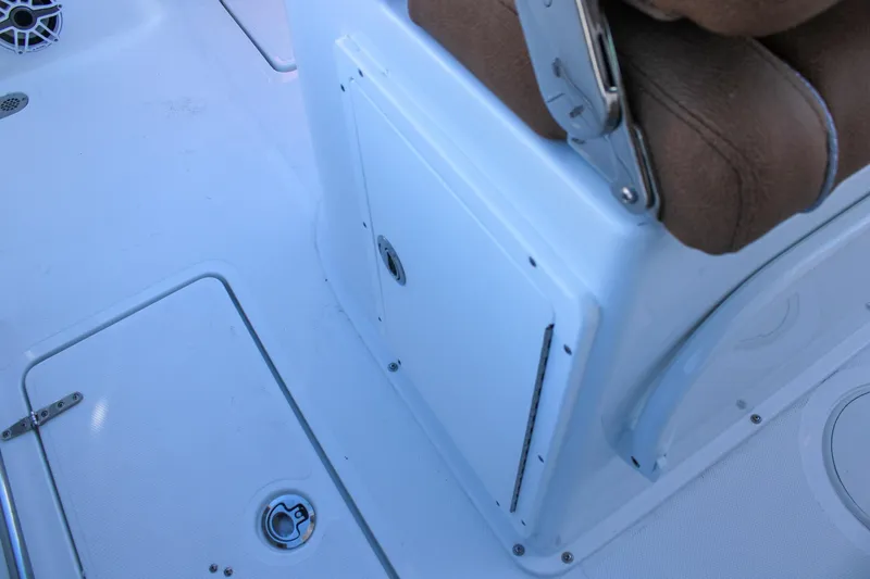 Slide: The Image of Interior view of 2026 Sea Hunt Gamefish 25 boat, featuring seating and storage compartments. - 45