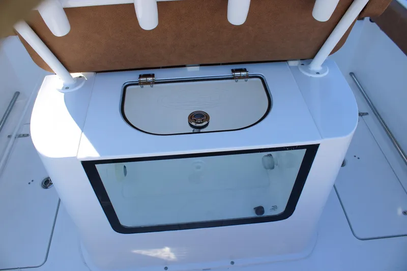 Slide: The Image of 2026 Sea Hunt Gamefish 25 boat interior with storage compartment and seating. - 6