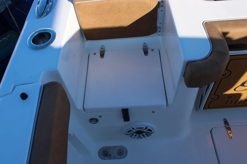 Slide: The Image of Interior view of 2026 Sea Hunt Gamefish 25 boat, featuring seating and storage area. - 8