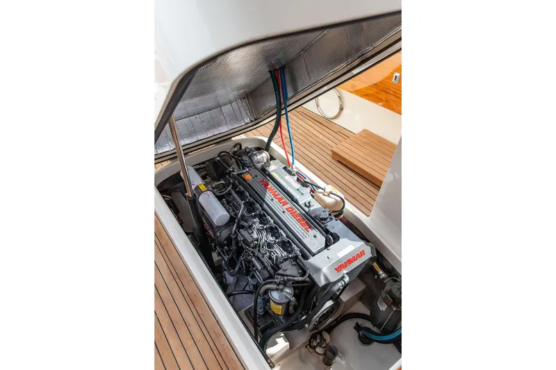 Slide: The Image of Engine compartment of 2005 Hinckley Picnic Boat EP with Yanmar diesel engine. - 18