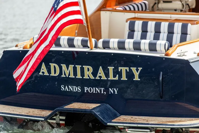 Slide: The Image of 2005 Hinckley Picnic Boat EP with American flag, named "Admiralty," Sands Point, NY. - 20