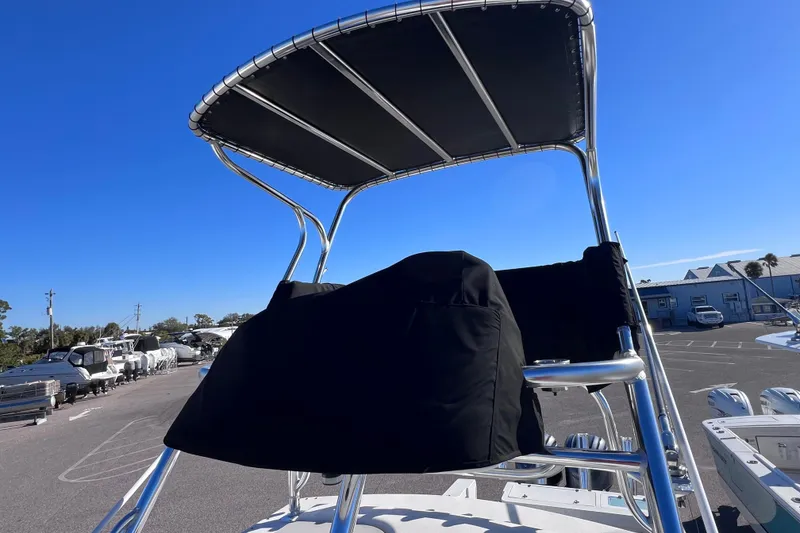 Slide: The Image of 2023 Parker 2820 XLD Sport Cabin boat with T-top and covered helm station. - 20
