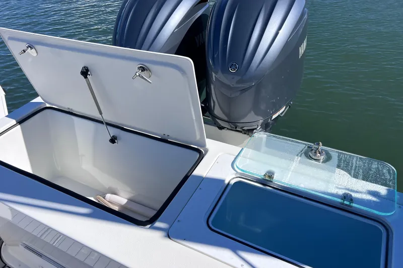 Slide: The Image of 2023 Parker 2820 XLD Sport Cabin boat with open storage and dual engines. - 34