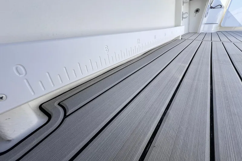 Slide: The Image of 2023 Parker 2820 XLD Sport Cabin boat deck with ruler detail. - 43