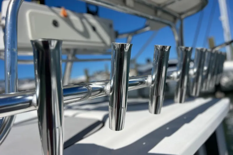 Slide: The Image of Close-up of rod holders on a 2023 Parker 2820 XLD Sport Cabin boat. - 47