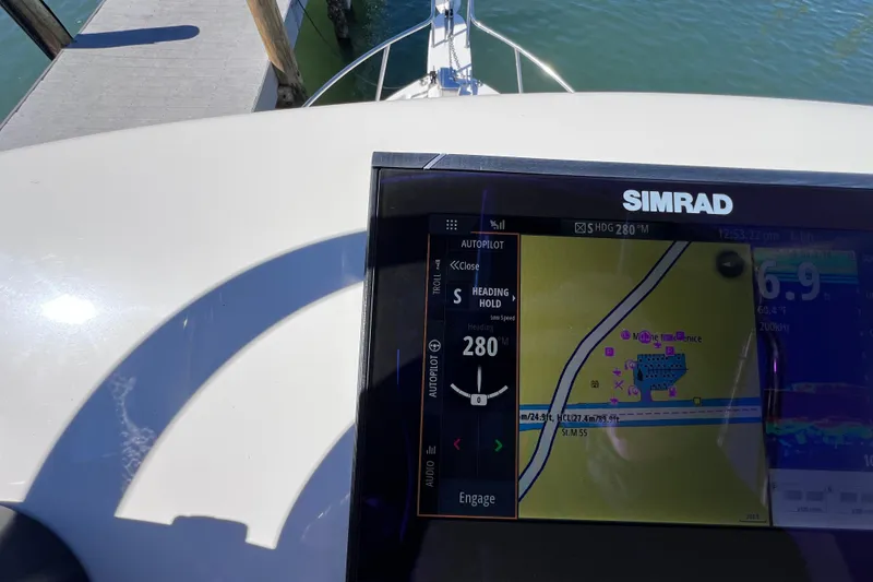 Slide: The Image of Simrad navigation display on 2023 Parker 2820 XLD Sport Cabin boat. - 58