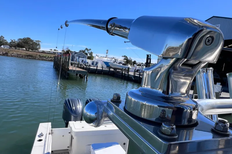 Slide: The Image of Close-up of 2023 Parker 2820 XLD Sport Cabin boat's fishing rod holder on a sunny day. - 62