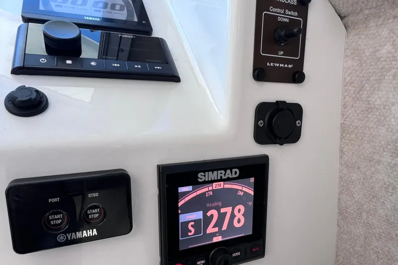 Slide: The Image of Control panel of 2023 Parker 2820 XLD Sport Cabin with Simrad and Yamaha displays. - 78