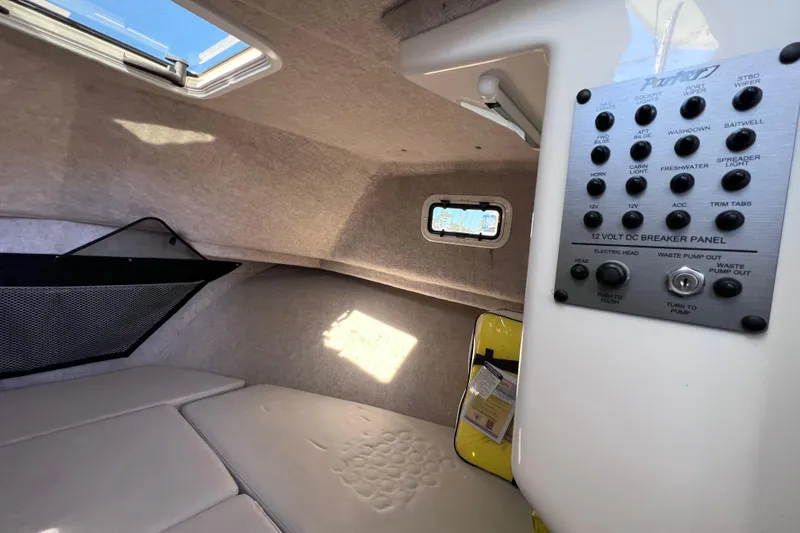 Slide: The Image of 2023 Parker 2820 XLD Sport Cabin interior with control panel and seating area. - 83