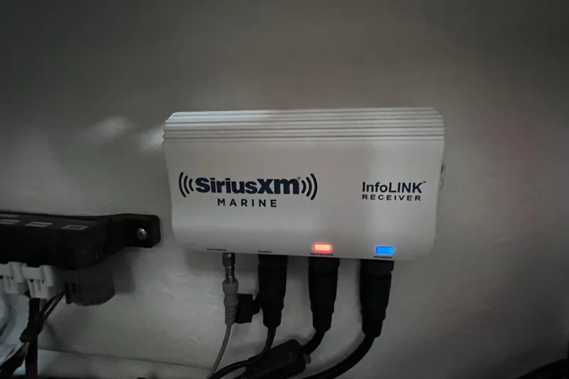 Slide: The Image of SiriusXM Marine InfoLINK receiver installed on 2023 Parker 2820 XLD Sport Cabin boat. - 87