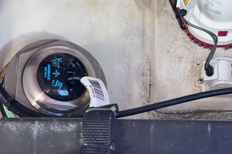 Slide: The Image of Close-up of 2023 Parker 2820 XLD Sport Cabin boat's keel tilt mechanism. - 95