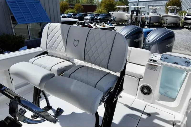 Slide: The Image of 2026 Sea Fox 268 Commander boat interior with dual Yamaha engines and luxury seating. - 7