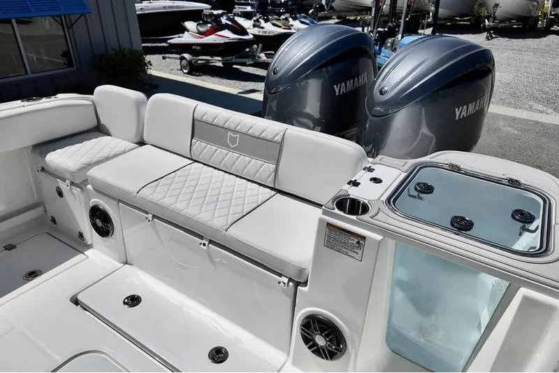 Slide: The Image of 2026 Sea Fox 268 Commander boat interior with Yamaha engines and seating area. - 8