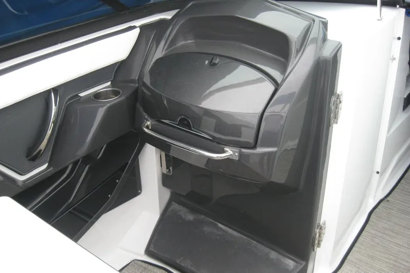 Slide: The Image of 2024 Monterey 275SS Super Sport boat interior with luxurious seating and control panel. - 11