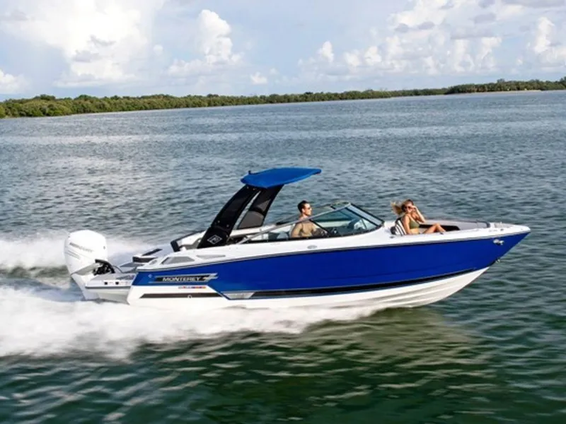 Slide: The Image of 2024 Monterey 275SS Super Sport boat, blue and white design, side view. - 15