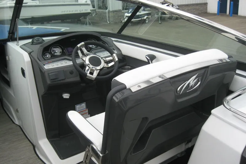 Slide: The Image of 2024 Monterey 275SS Super Sport interior with sleek black and white seating design. - 8