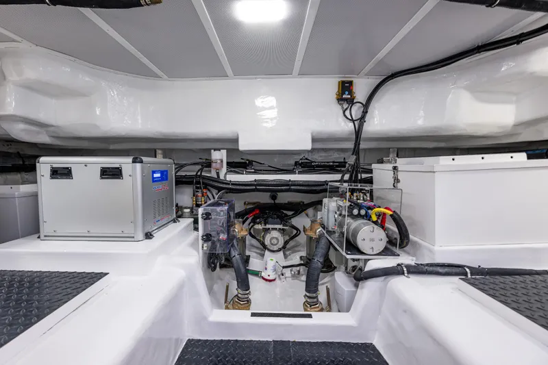 Slide: The Image of Engine room of 2024 Northwest 55 boat with modern equipment and wiring. - 20