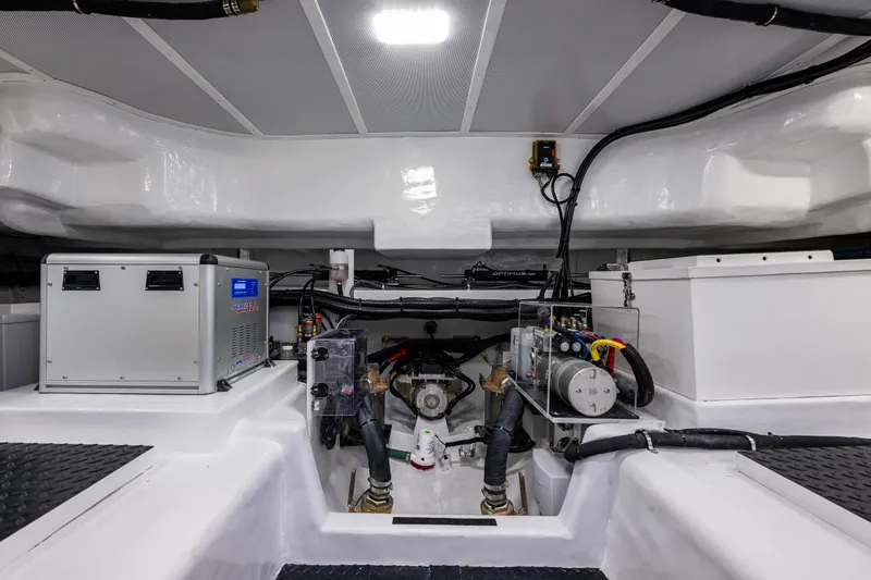 Slide: The Image of Engine room of 2024 Northwest 55 yacht, showcasing advanced machinery and equipment. - 21
