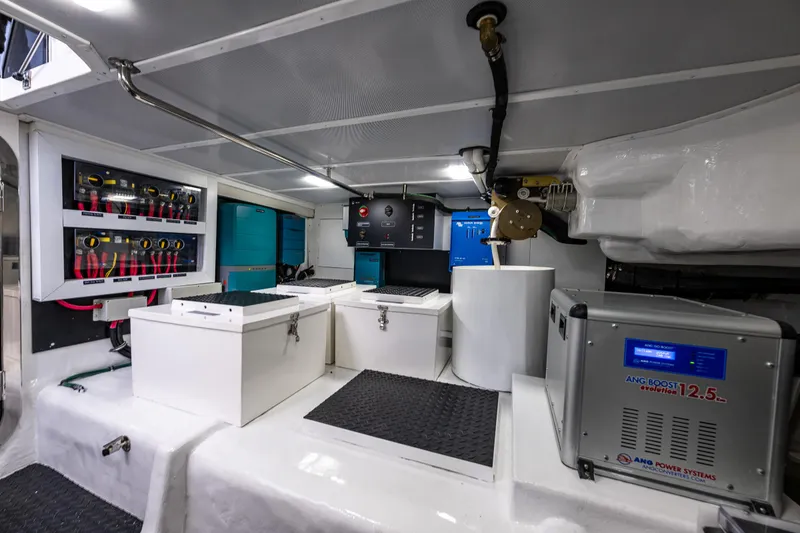 Slide: The Image of Engine room of 2024 Northwest 55 yacht with advanced power systems and control panels. - 22