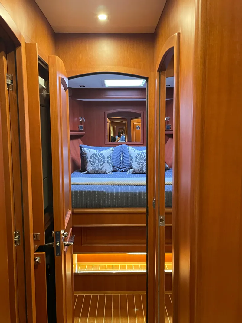 Slide: The Image of Luxurious cabin interior of 2024 Northwest 55 yacht with elegant wood finish. - 27