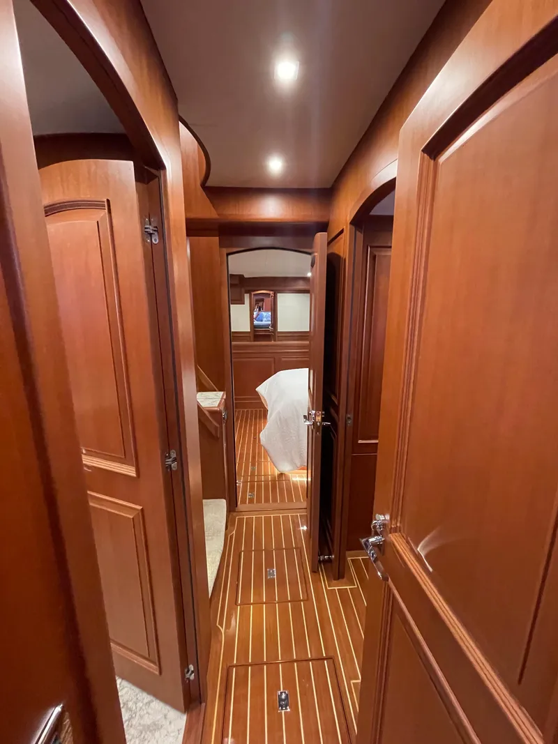 Slide: The Image of Luxurious wooden interior of 2024 Northwest 55 yacht hallway. - 29