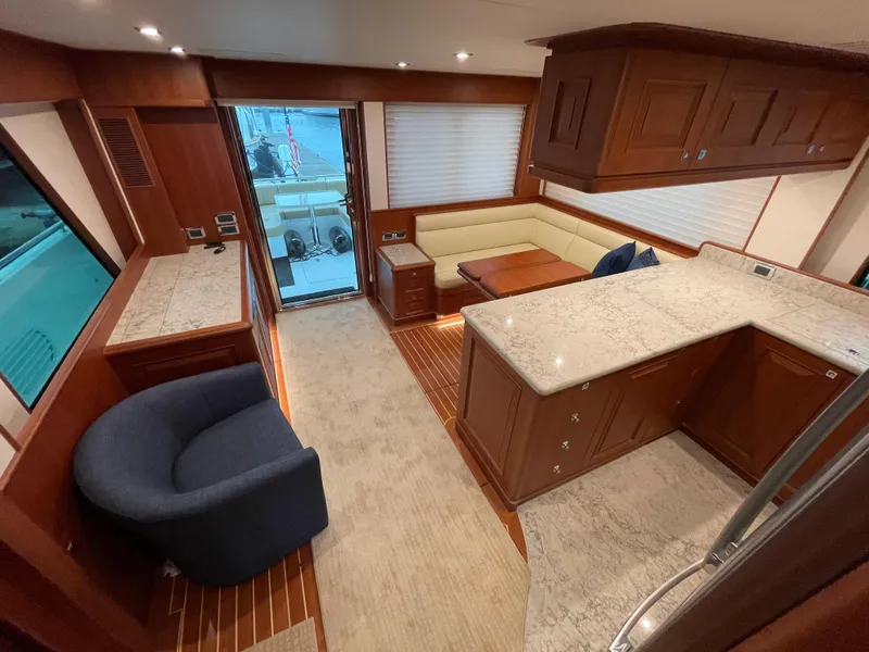Slide: The Image of Luxurious interior of 2024 Northwest 55 yacht with elegant wood and marble finishes. - 42