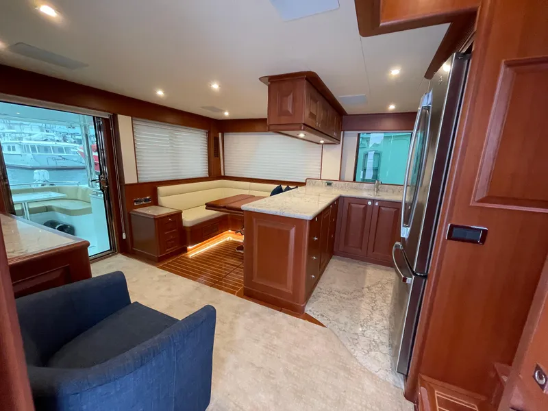 Slide: The Image of Luxurious interior of 2024 Northwest 55 yacht with modern kitchen and seating area. - 43