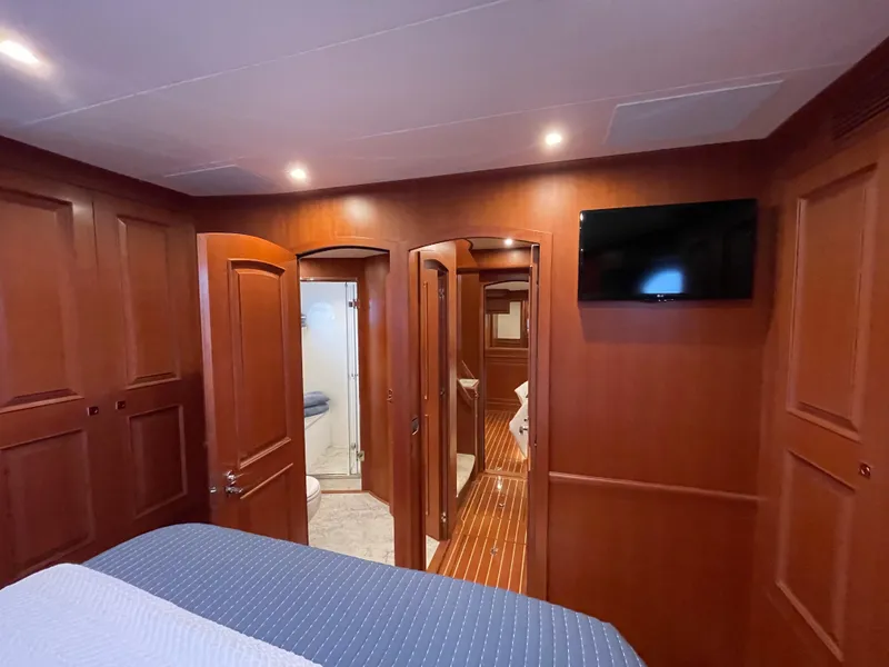 Slide: The Image of Luxurious cabin interior of 2024 Northwest 55 yacht with wood paneling and modern amenities. - 47