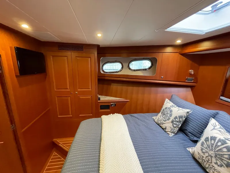 Slide: The Image of Luxurious cabin interior of 2024 Northwest 55 yacht with elegant wood finish. - 48