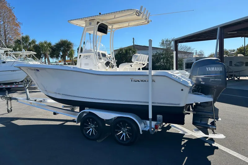 Slide: The Image of 2011 Tidewater 216 CC Adventure boat on trailer with Yamaha outboard motor. - 4