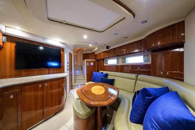 Slide: The Image of Luxurious interior of 2004 Sea Ray 550 Sundancer yacht with plush seating and modern amenities. - 19