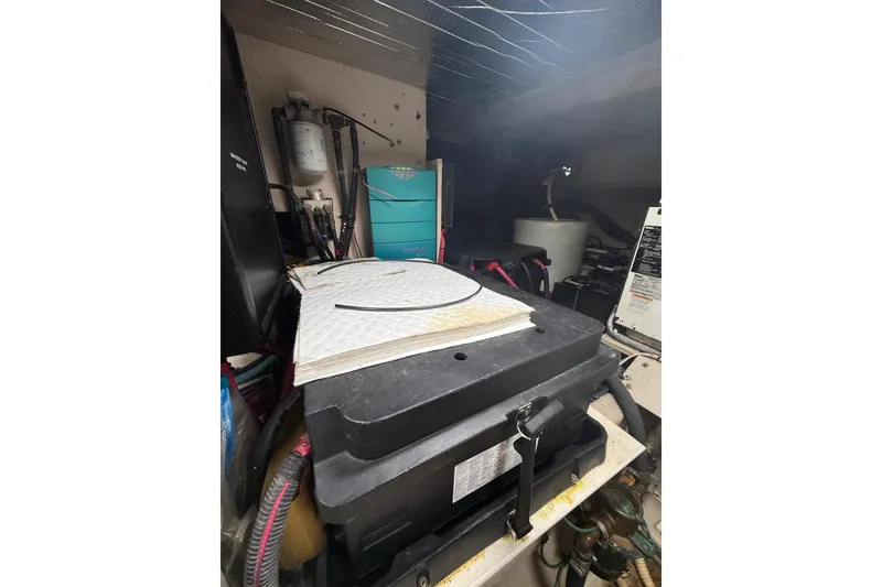Slide: The Image of Electrical system inside a 2004 Sea Ray 550 Sundancer boat, featuring ProMariner ProNautic charger. - 69