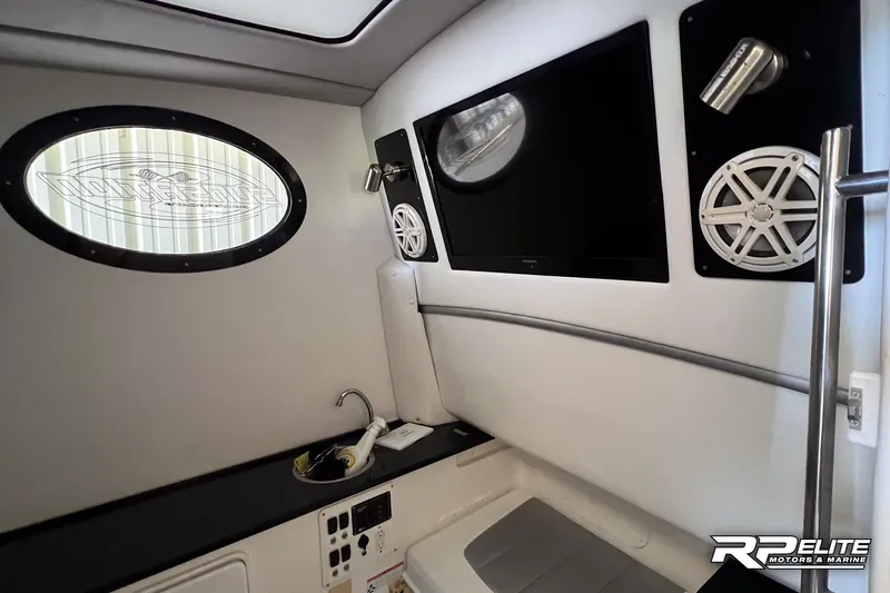 Slide: The Image of Interior of 2013 Sunsation 34 CCX boat with speakers and window. - 20