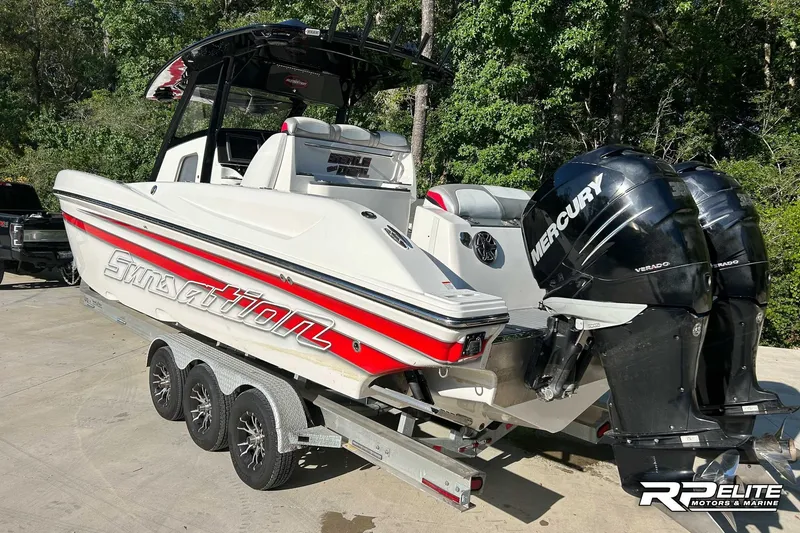 Slide: The Image of 2013 Sunsation 34 CCX boat with Mercury engines on a trailer. - 27