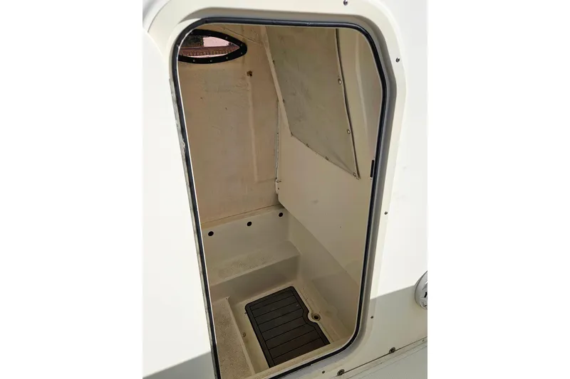 Slide: The Image of 2018 NauticStar 25 XS boat interior cabin view. - 17