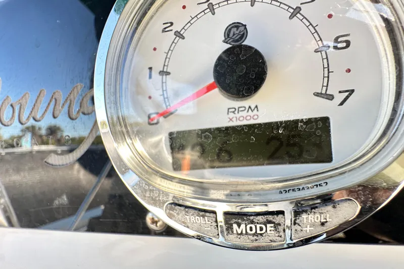 Slide: The Image of Close-up of 2014 Young Boats 20 bay boat tachometer displaying RPM. - 24
