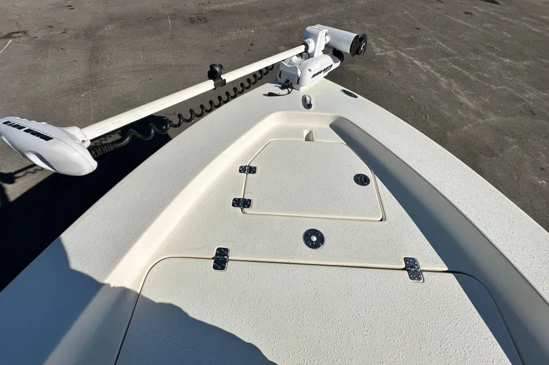 Slide: The Image of 2014 Young Boats 20 Bay Boat with trolling motor on deck. - 32