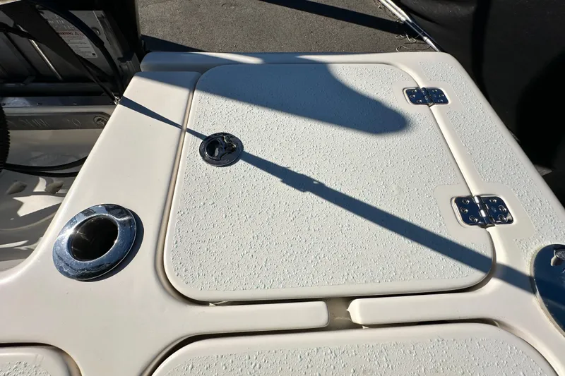 Slide: The Image of 2014 Young Boats 20 Bay Boat deck with stainless steel fittings and textured surface. - 57
