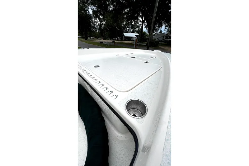 Slide: The Image of 2014 Young Boats 20 Bay Boat on trailer with canopy and Mercury engine. - 6