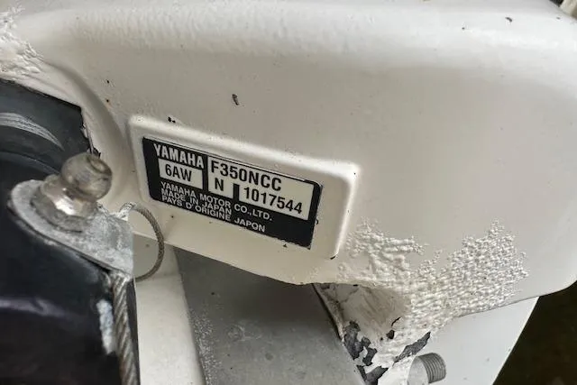 Slide: The Image of 2019 Regal 33 OBX with Yamaha F350NCC engine label, showing model and serial number. - 32