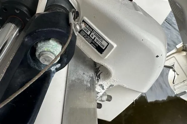 Slide: The Image of Close-up of a 2019 Regal 33 OBX boat engine component with visible serial number. - 33