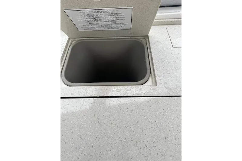 Slide: The Image of 2019 Regal 33 OBX boat sink with countertop detail. - 38