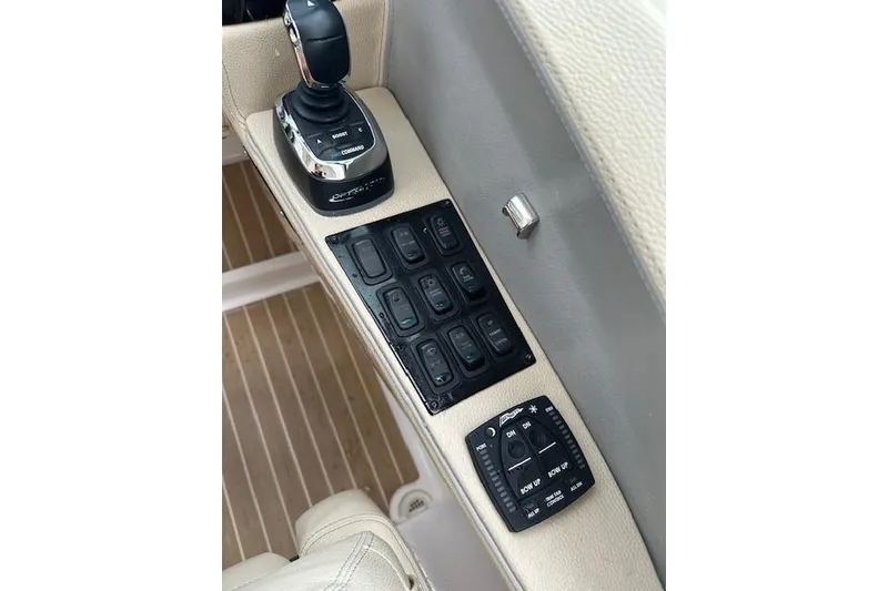 Slide: The Image of Control panel of 2019 Regal 33 OBX boat with joystick and switches. - 45