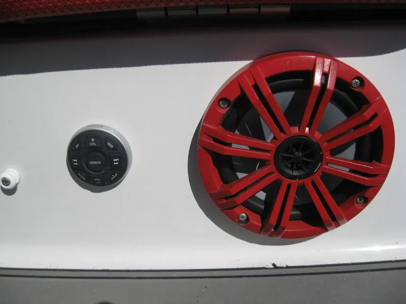 Slide: The Image of 2016 Scarab 195 HO Impulse boat speaker and control panel. - 14