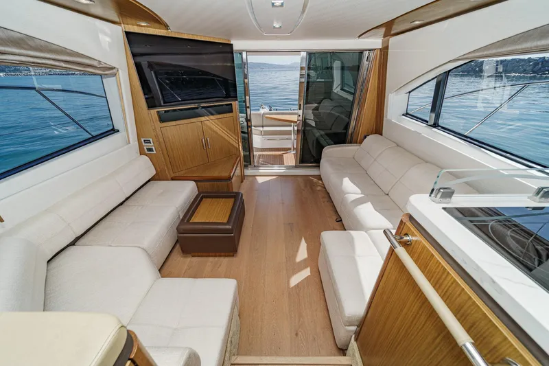 Slide: The Image of Luxurious interior of 2018 Sea Ray Fly 510 yacht with elegant seating and ocean view. - 20