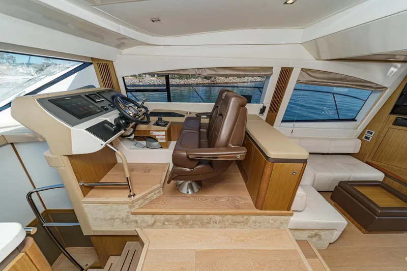 Slide: The Image of Luxurious interior of 2018 Sea Ray Fly 510 yacht with modern helm and seating. - 27
