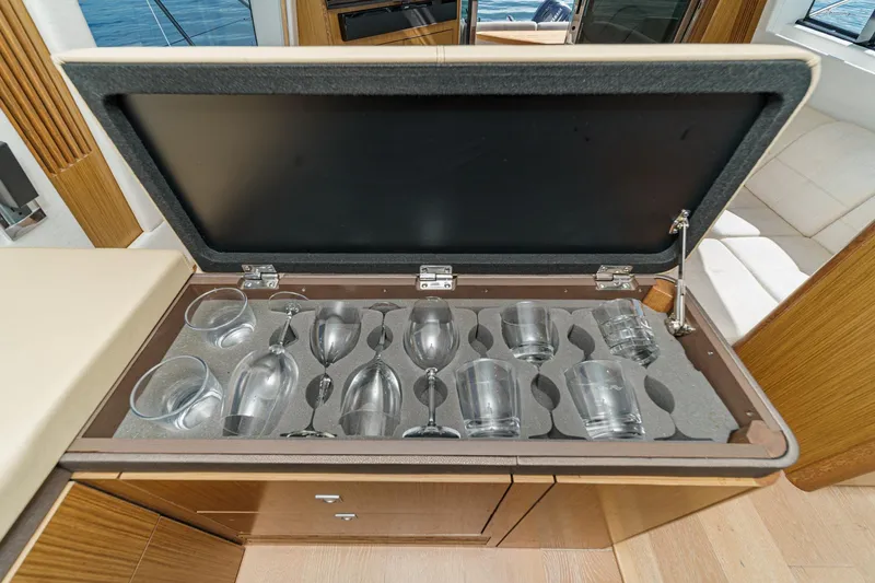 Slide: The Image of Luxury glassware storage on 2018 Sea Ray Fly 510 yacht. - 31